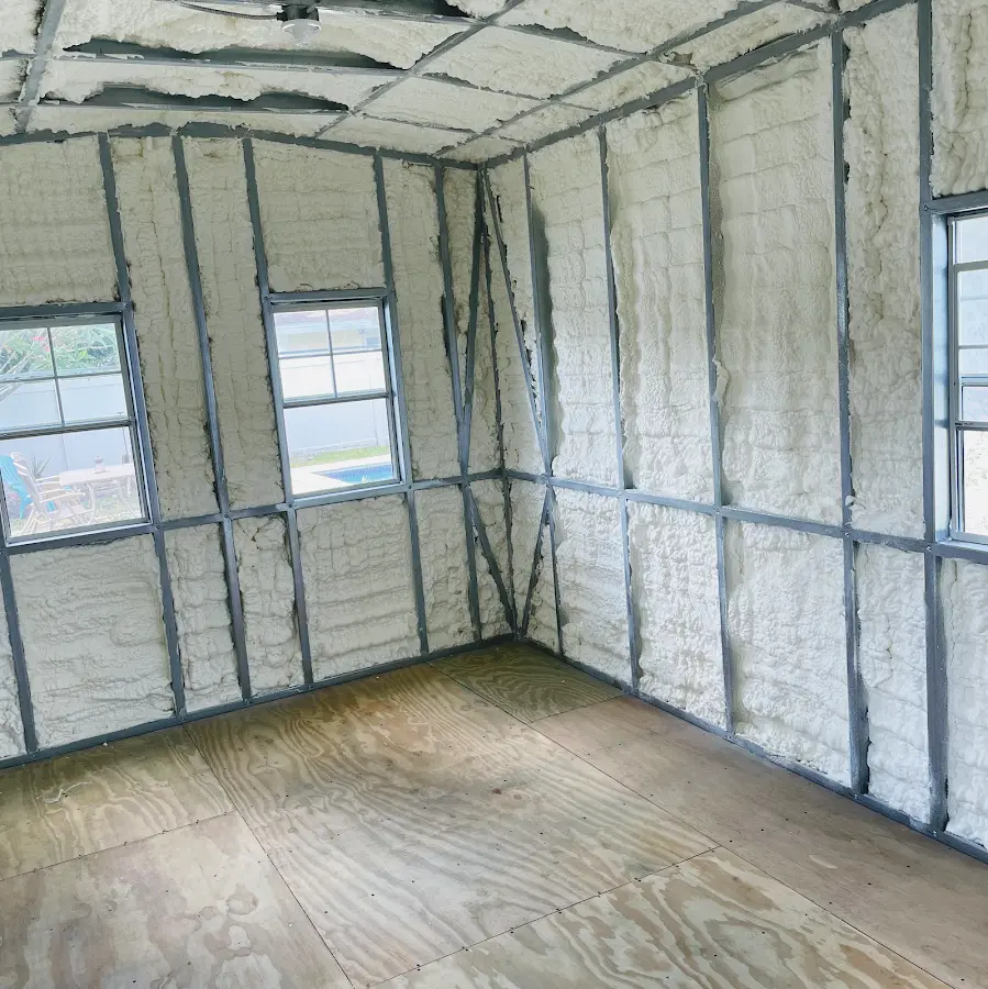 Closed-cell spray foam insulation applied to wall cavities in a residential project in Princeton